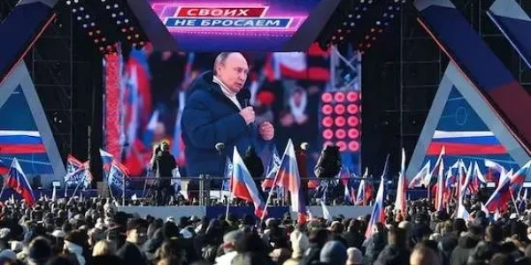 Vladimir Putin during the eighth anniversary of the annexation of Crimea at the Luzhniki Stadium in Moscow, March 18, 2022. (Photo by VLADIMIR ASTAPKOVICH / SPUTNIK/EPA)